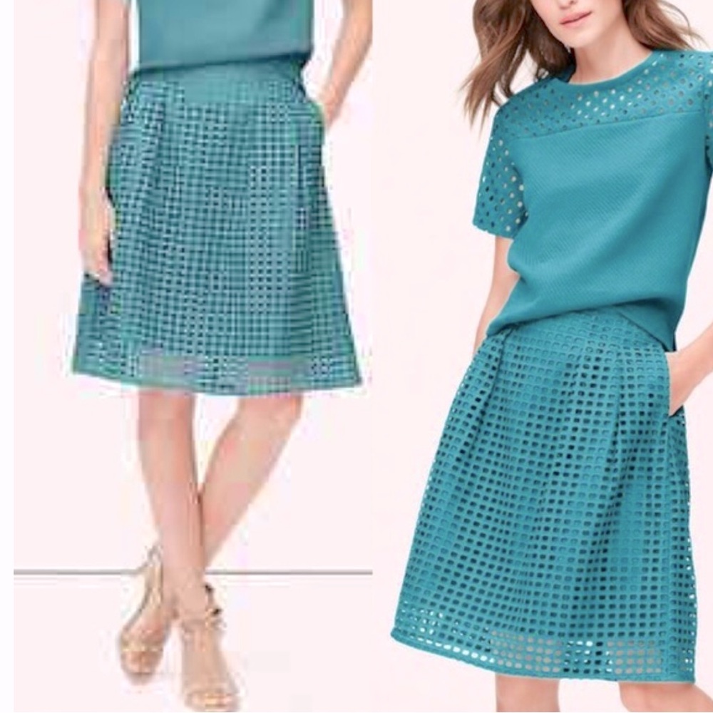 LOFT geo eyelet skirt in teal / jade color. 100% cotton. Side pockets EUC Size 8